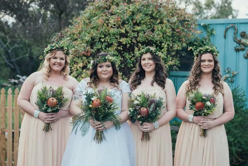 Bride and bridesmaids with flower crowns and boho bridal hair