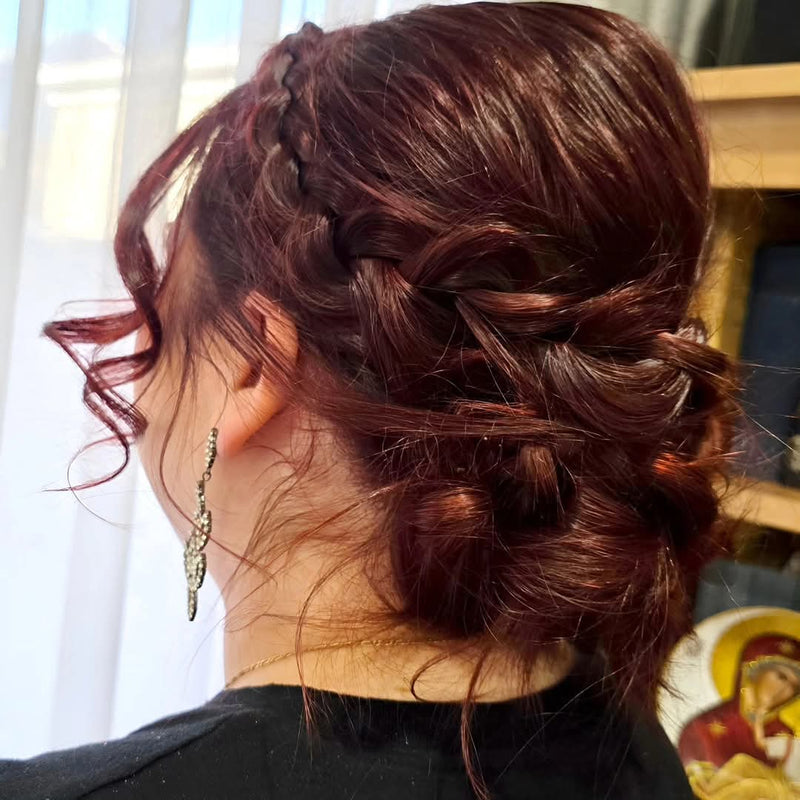Braided bridal updo with loose curls